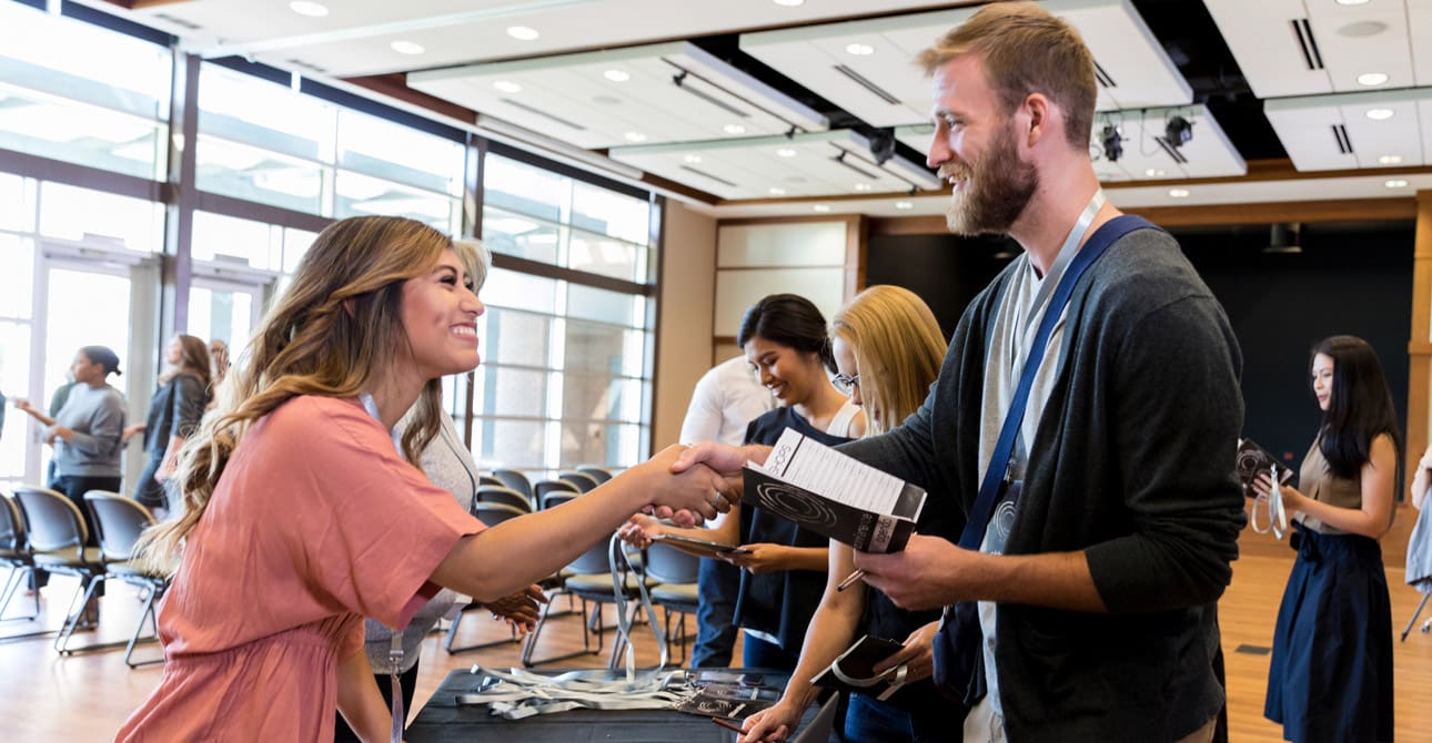 Conference-attendee-registering-for-a-breakout-session
